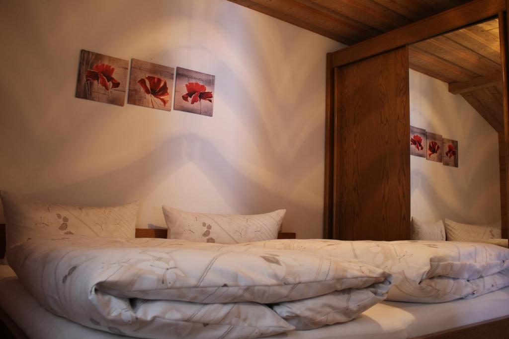 Postel nebo postele na pokoji v ubytování Haus Hermi