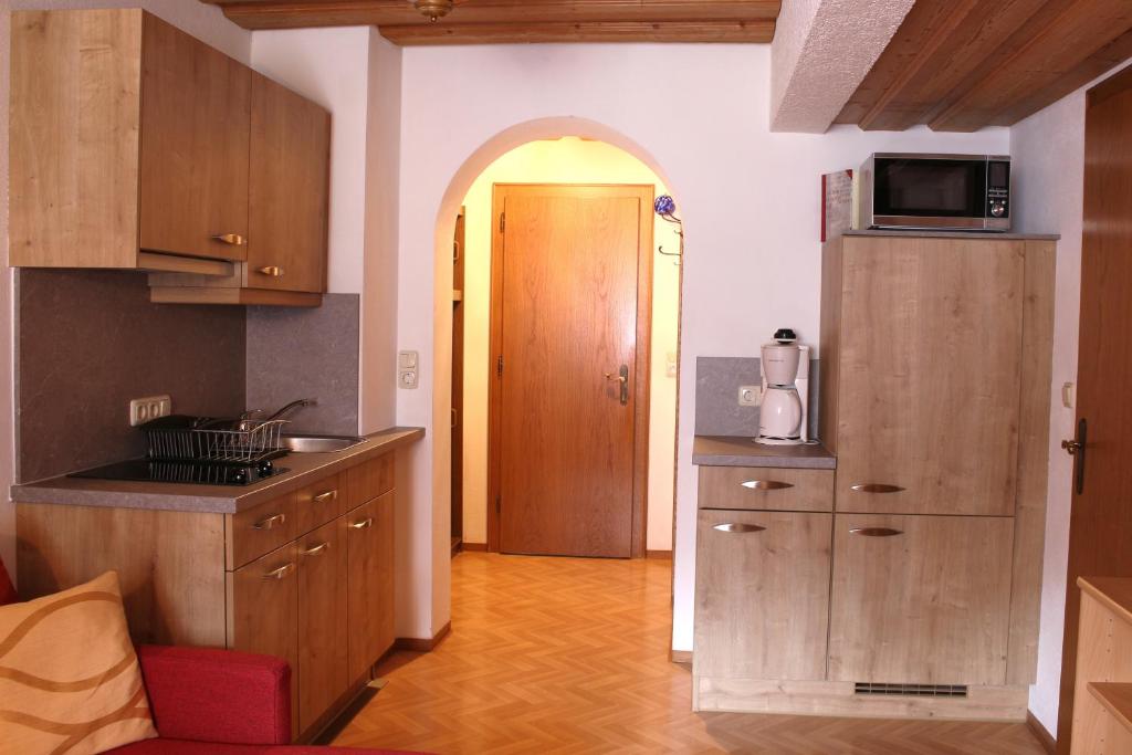 Kuchyň nebo kuchyňský kout v ubytování Haus Hermi