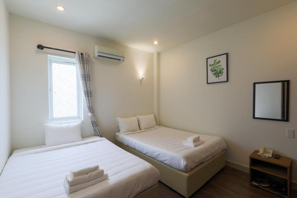 Postel nebo postele na pokoji v ubytování Vitalis Riverside Hotel