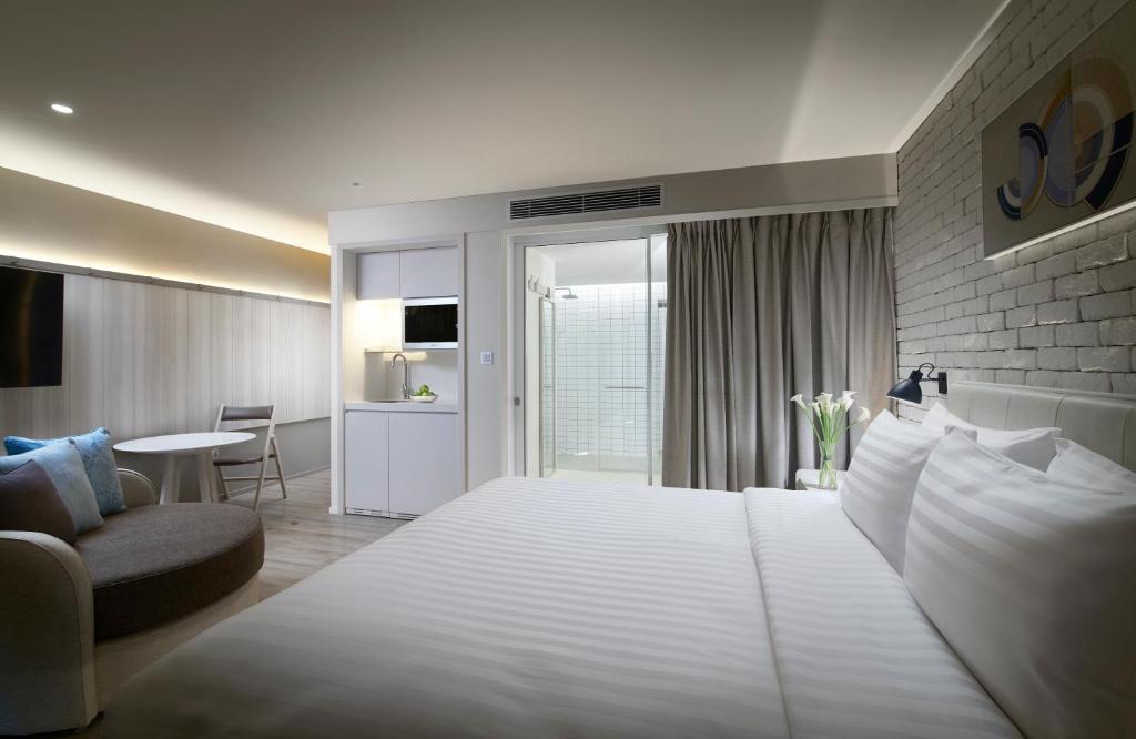 Giường trong phòng chung tại Shama Yen-Akat Bangkok