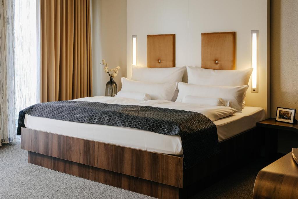 Postel nebo postele na pokoji v ubytování Hotel Global Inn