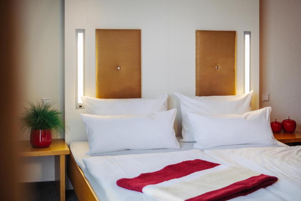 Postel nebo postele na pokoji v ubytování Hotel Global Inn