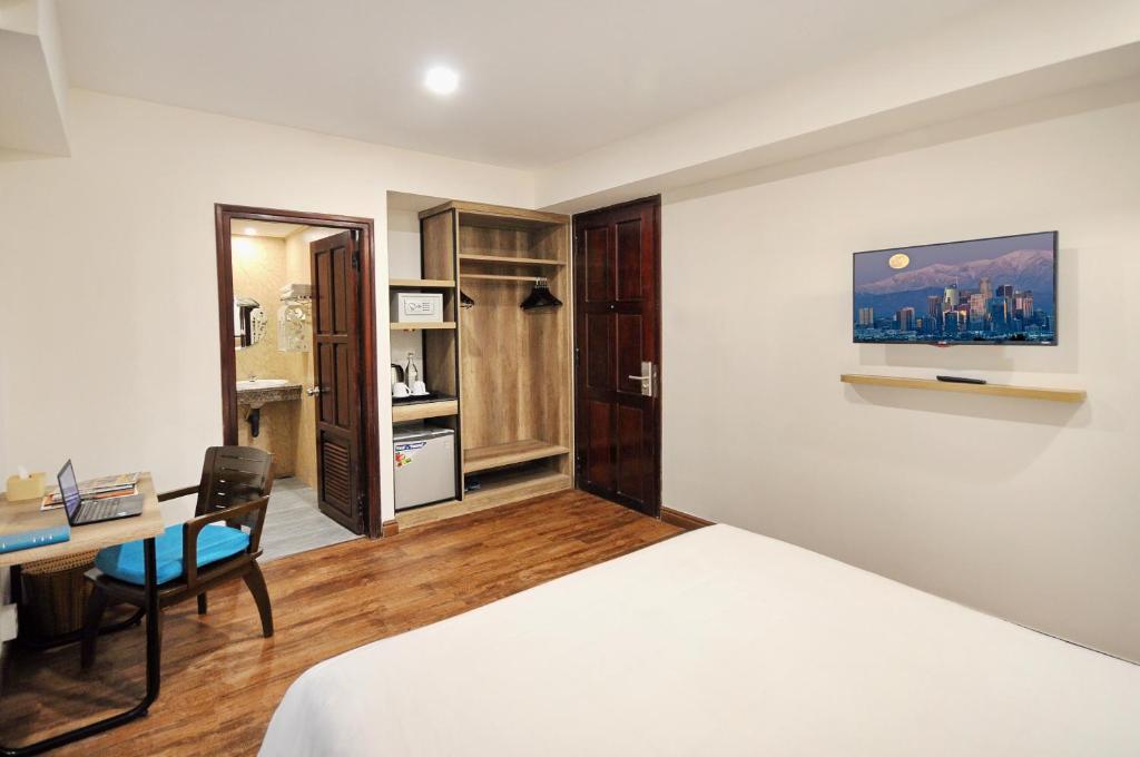 Kuchyň nebo kuchyňský kout v ubytování Golden Lotus Hotel