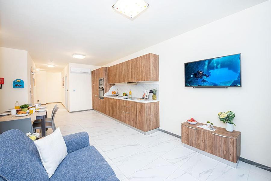 Kuchyň nebo kuchyňský kout v ubytování Atlantis Holiday Suites