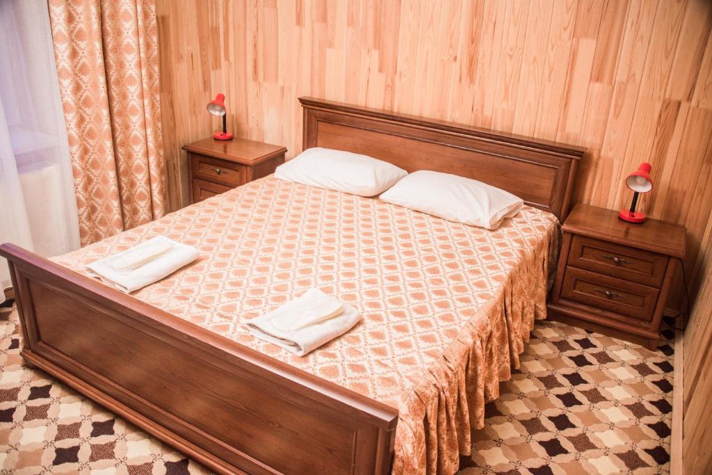Postel nebo postele na pokoji v ubytování Olga Hotel SPA