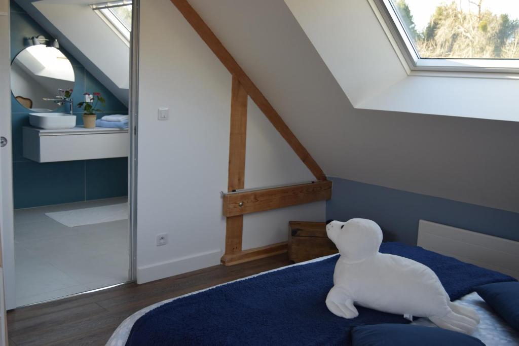 Postel nebo postele na pokoji v ubytování Les chambres d hôtes de l entre deux baies à Merlimont entre Berck et le Touquet