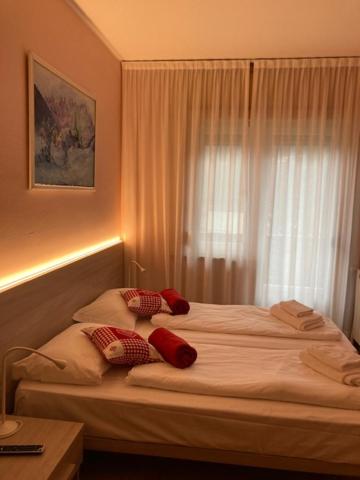 Postel nebo postele na pokoji v ubytování Adriatico Rooms