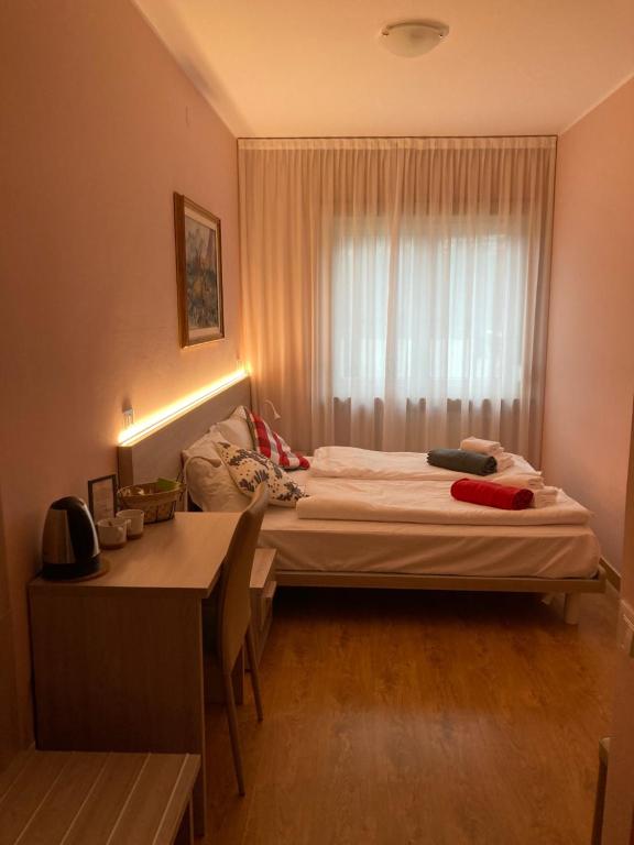 Postel nebo postele na pokoji v ubytování Adriatico Rooms