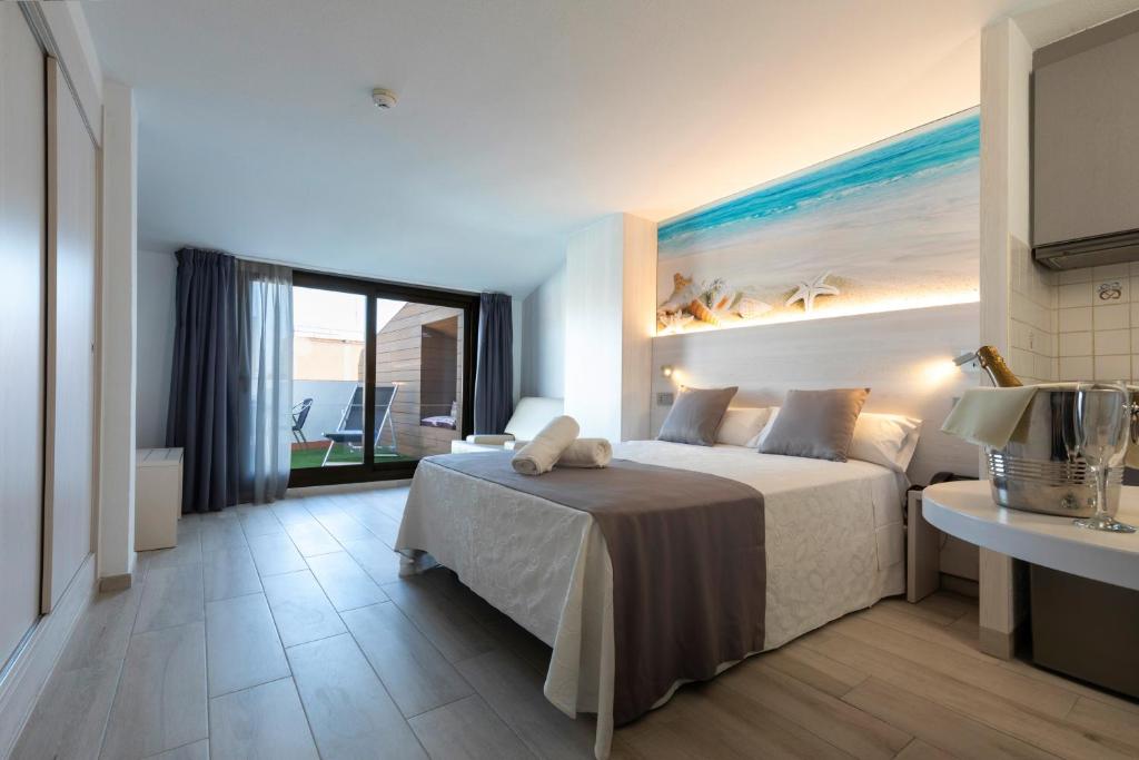 Postel nebo postele na pokoji v ubytování Aparthotel Miami Park