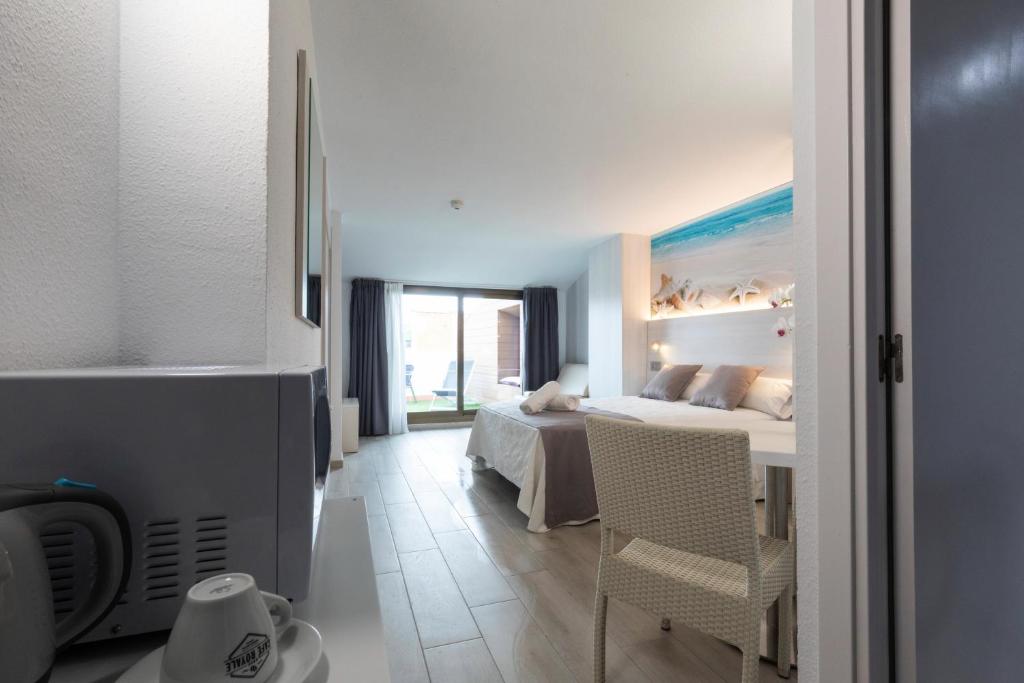 Postel nebo postele na pokoji v ubytování Aparthotel Miami Park