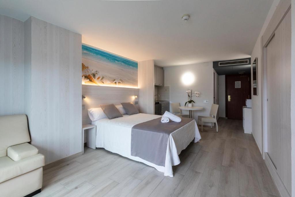 Postel nebo postele na pokoji v ubytování Aparthotel Miami Park