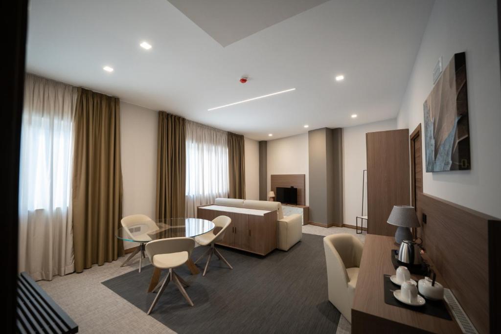 TV a/nebo společenská místnost v ubytování Building Hotel