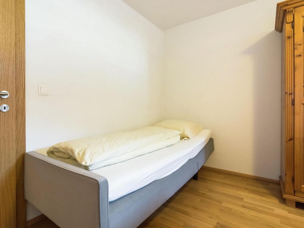 A bed or beds in a room at Luxurious holiday home with terrace in Tyrol