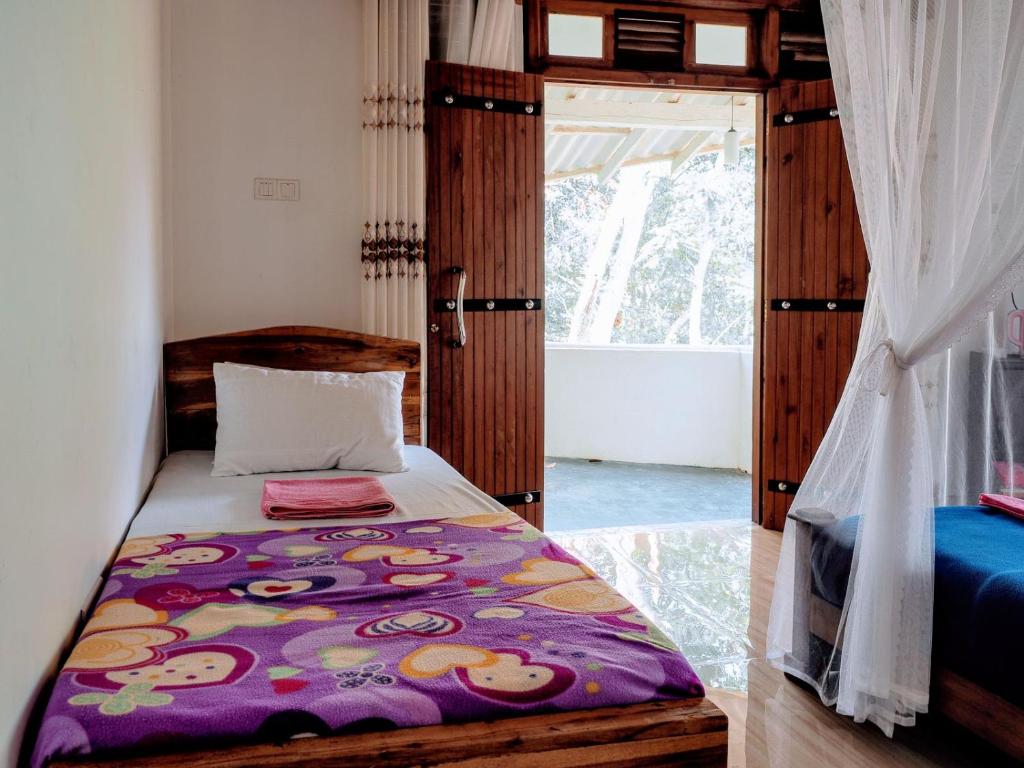 Postel nebo postele na pokoji v ubytování Ella Mount Villa