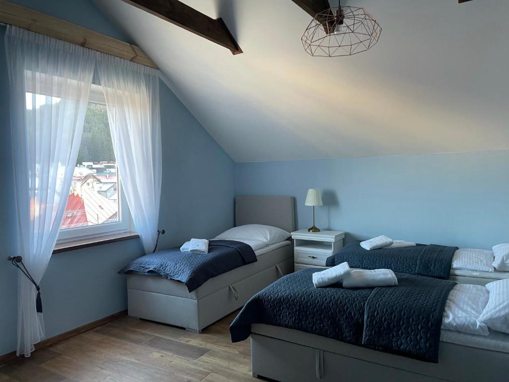 Postel nebo postele na pokoji v ubytování Totina Apartments