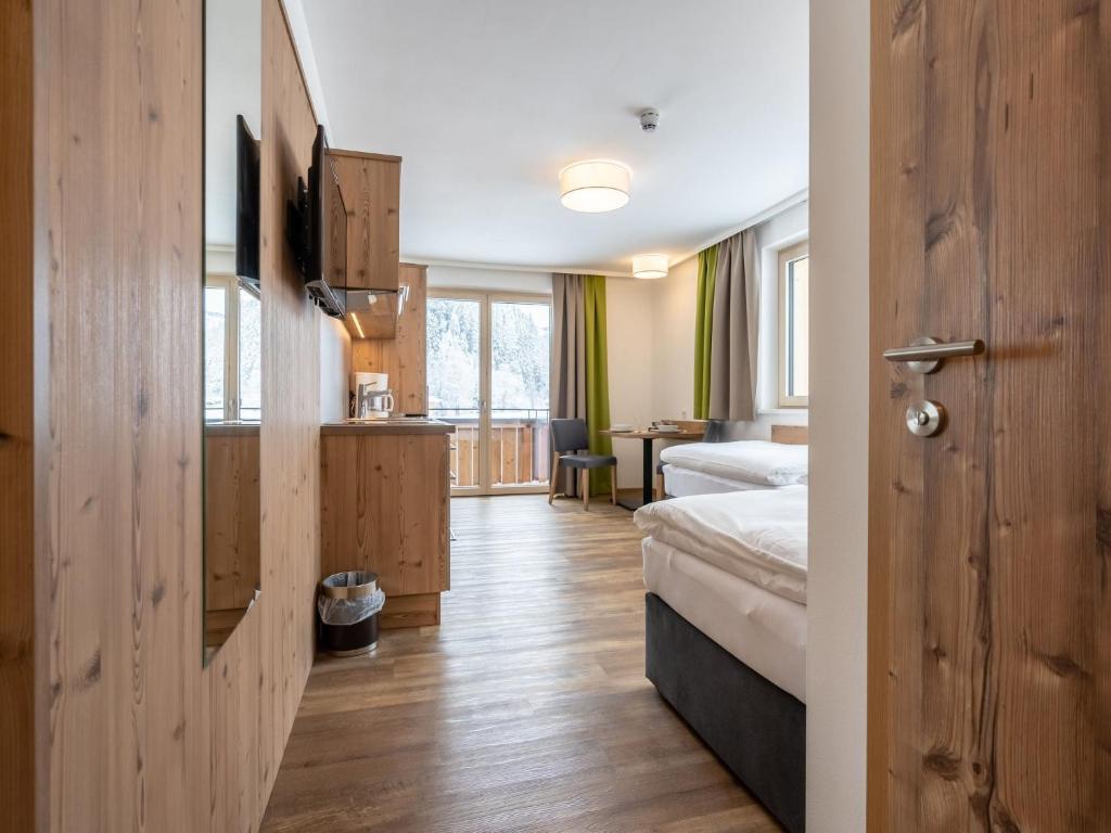 Posteľ alebo postele v izbe v ubytovaní Chalet with sauna and Jokercard in summer
