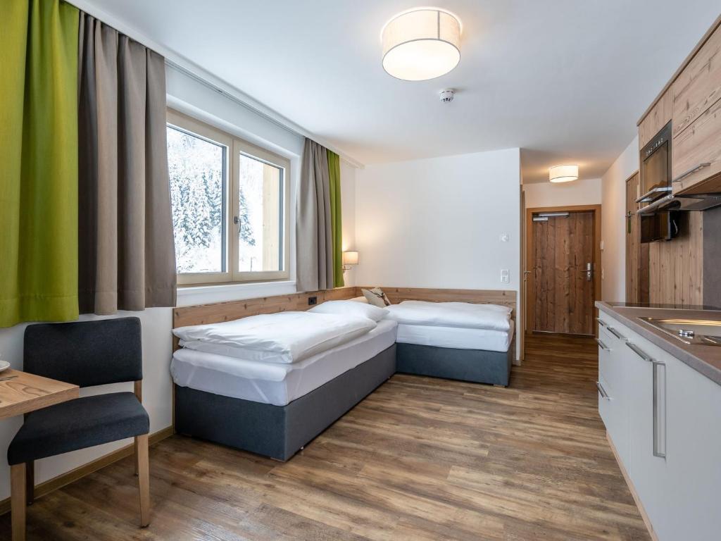 Posteľ alebo postele v izbe v ubytovaní Chalet with sauna and Jokercard in summer