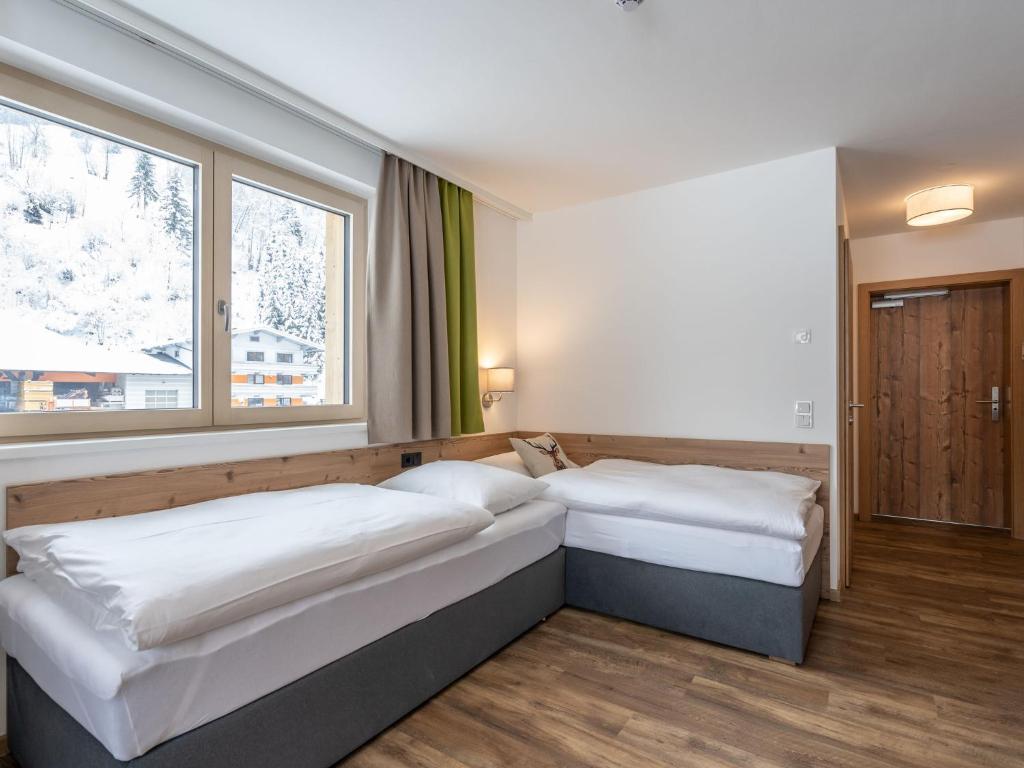 Posteľ alebo postele v izbe v ubytovaní Chalet with sauna and Jokercard in summer