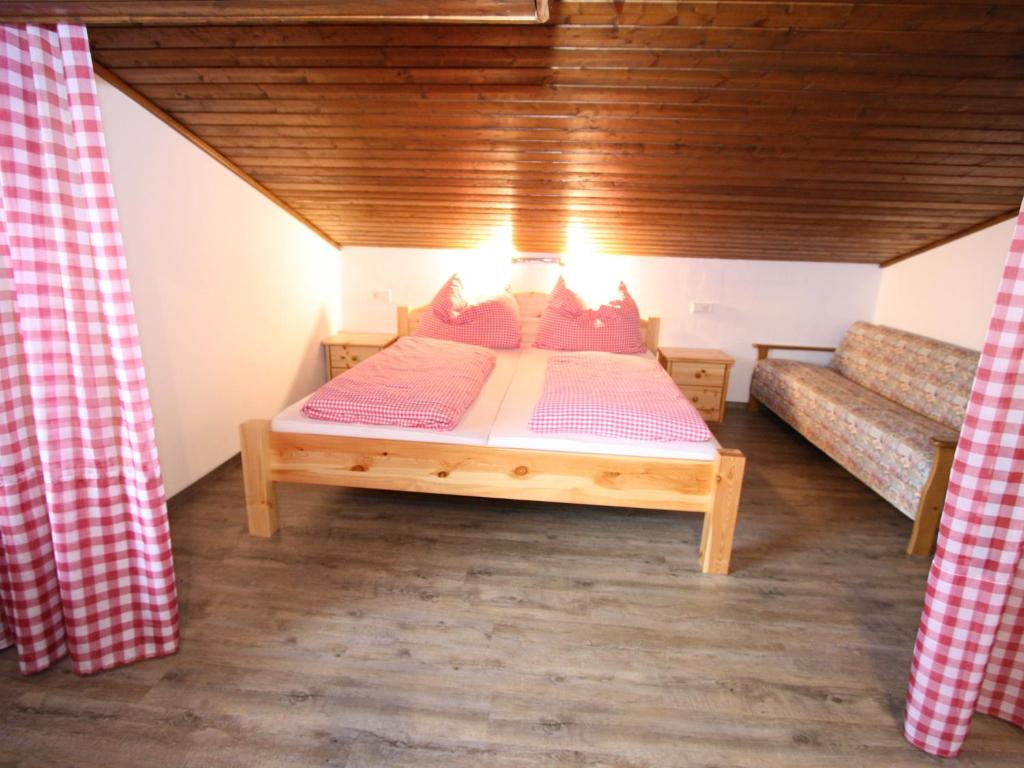 A bed or beds in a room at Apartment with balcony - formerly TUI Ferienhaus