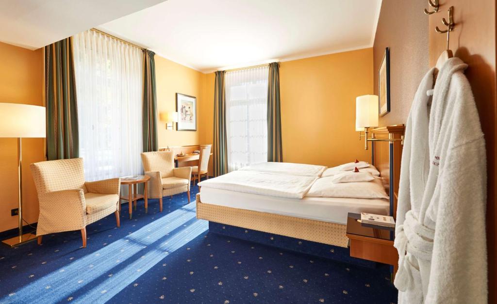 Postel nebo postele na pokoji v ubytování Hotel Therme Bad Teinach