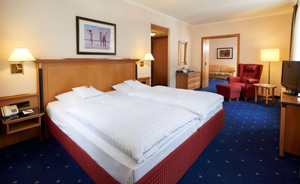 Postel nebo postele na pokoji v ubytování Hotel Therme Bad Teinach