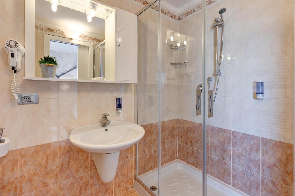 Koupelna v ubytování Hotel Nettuno