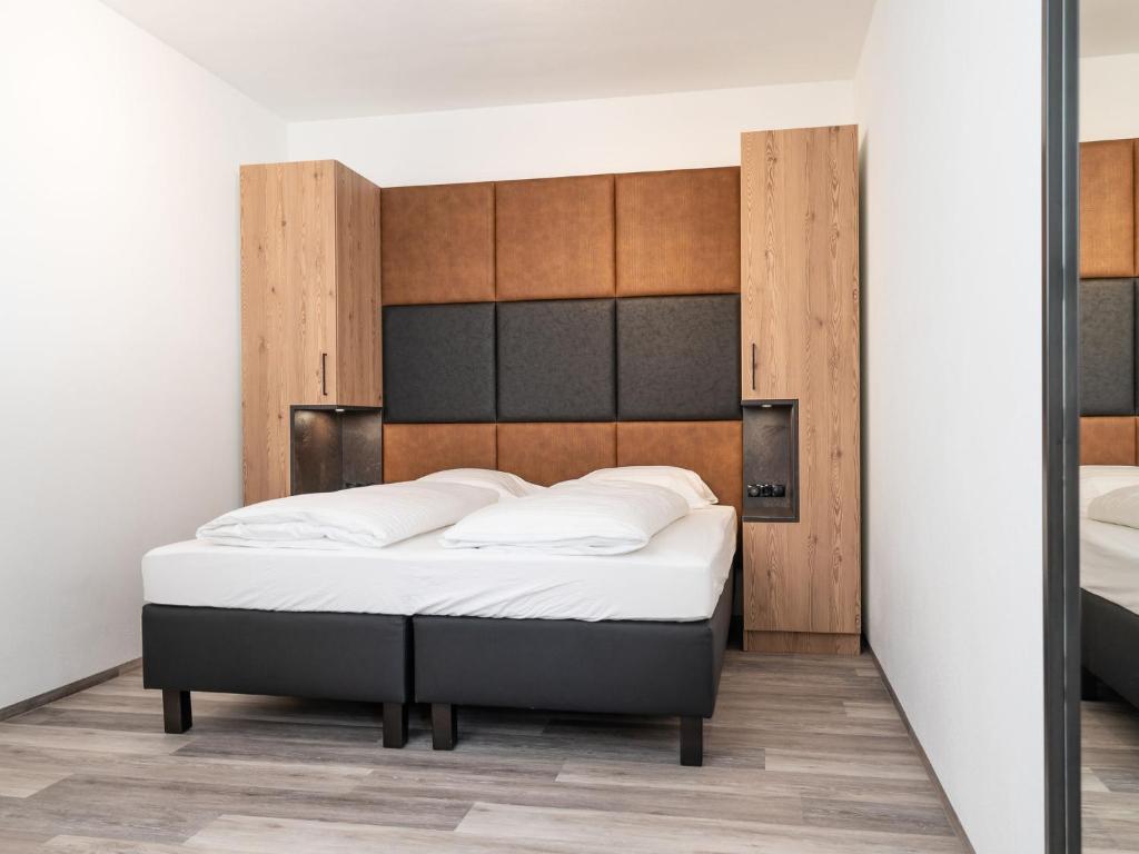 Posteľ alebo postele v izbe v ubytovaní Apartment in St Johann im Pongau with sauna