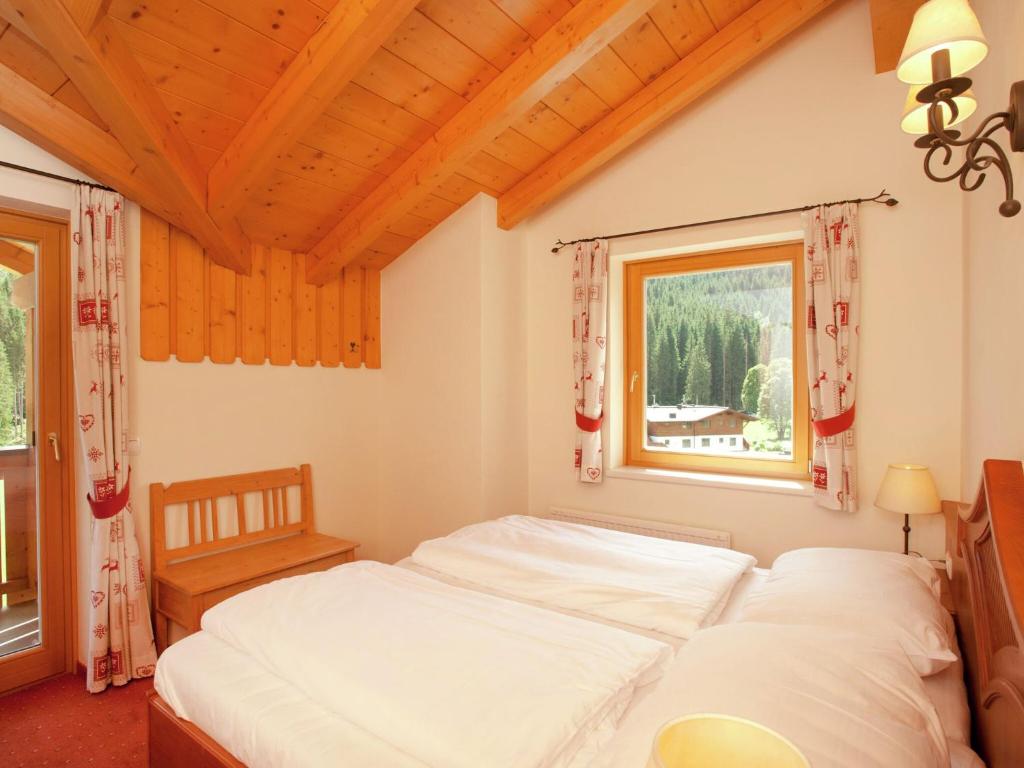 Posteľ alebo postele v izbe v ubytovaní Chalet apartment in Saalbach-Hinterglemm