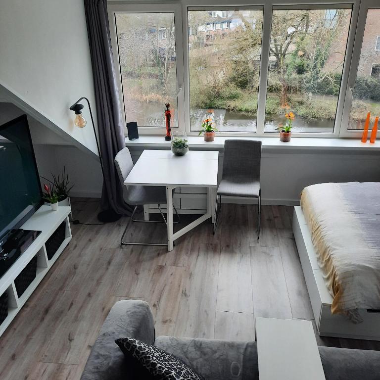 Posezení v ubytování Studio 76 Groningen met gratis leenfietsen
