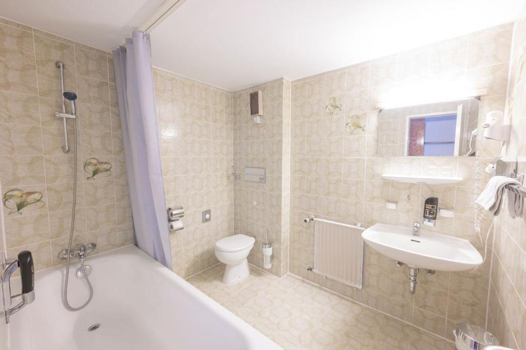 Koupelna v ubytování Hotel Astoria Stuttgart City