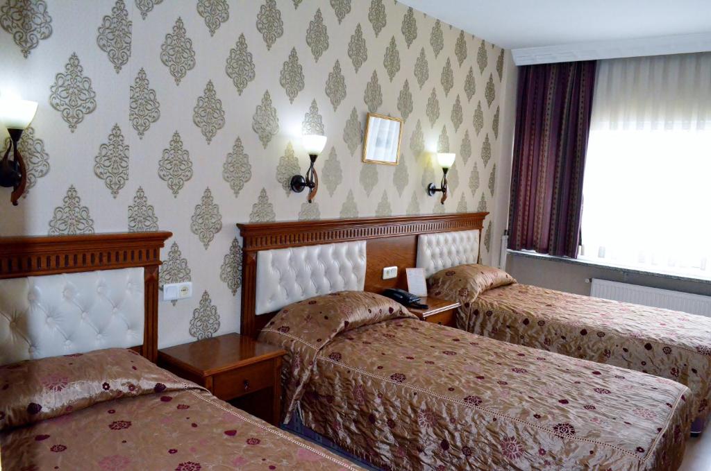 Voodi või voodid majutusasutuse Hotel Ebru Antique toas