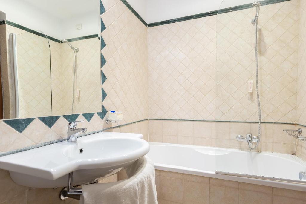 Koupelna v ubytování Hotel Medici
