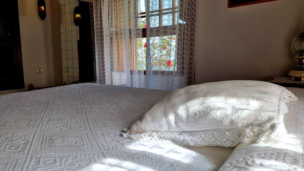 Postel nebo postele na pokoji v ubytování Manos de Oro