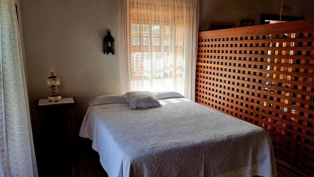 Postel nebo postele na pokoji v ubytování Manos de Oro