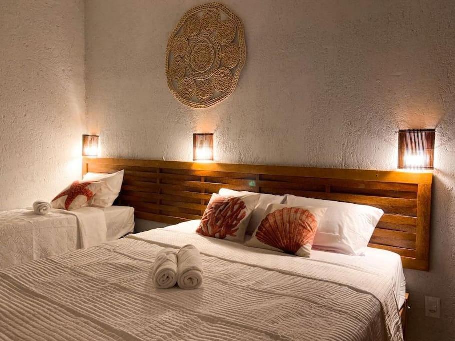 Postel nebo postele na pokoji v ubytování Brisa - Casa de charme com piscina privativa.