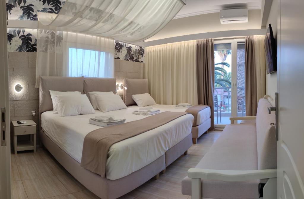 Postel nebo postele na pokoji v ubytování Galazio Asteri 1 Green, Luxury & Eco