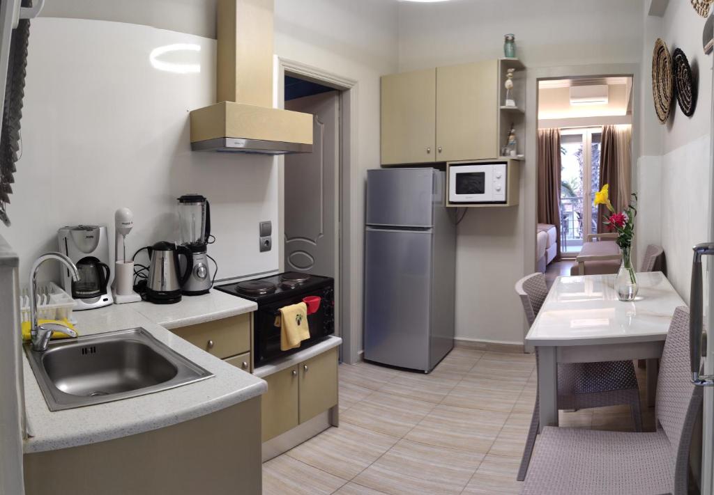Kuchyň nebo kuchyňský kout v ubytování Galazio Asteri 1 Green, Luxury & Eco