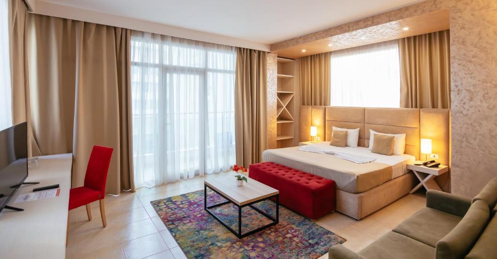 Postel nebo postele na pokoji v ubytování Horizont Hotel