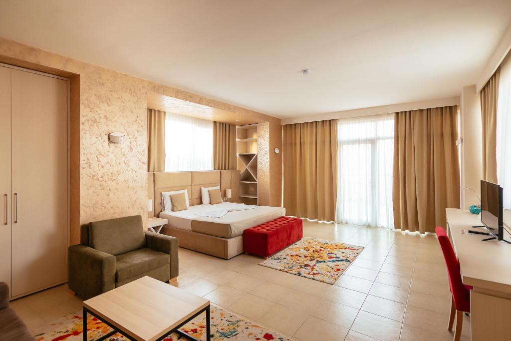TV a/nebo společenská místnost v ubytování Horizont Hotel