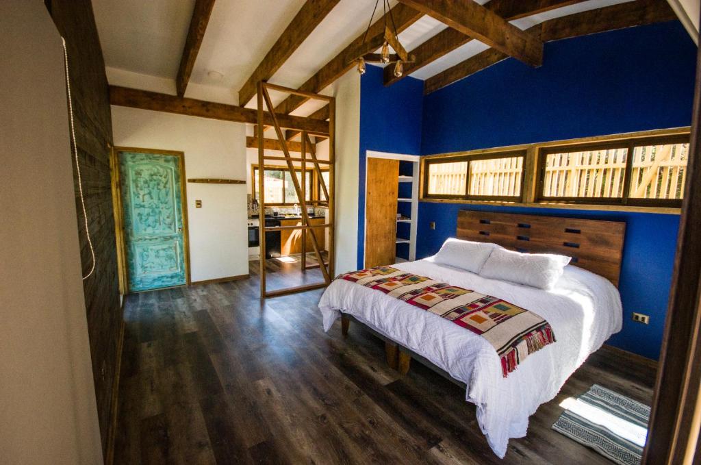 Postel nebo postele na pokoji v ubytování cabaña con tinaja en viña narbona wines