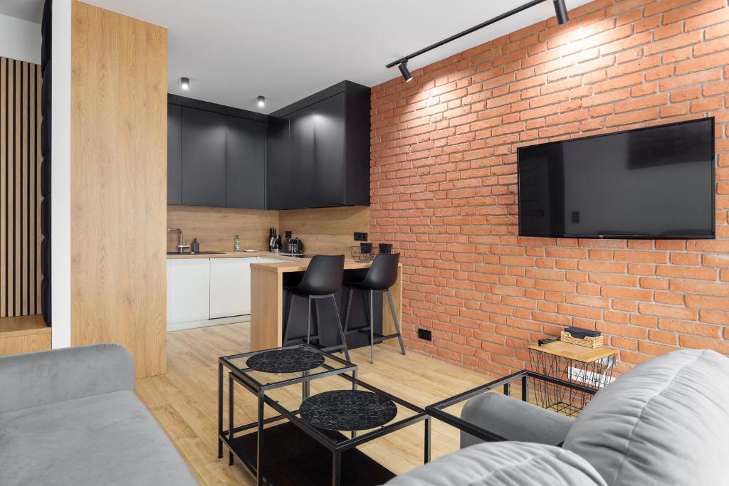 Kuchyň nebo kuchyňský kout v ubytování Brand New Business Apartament