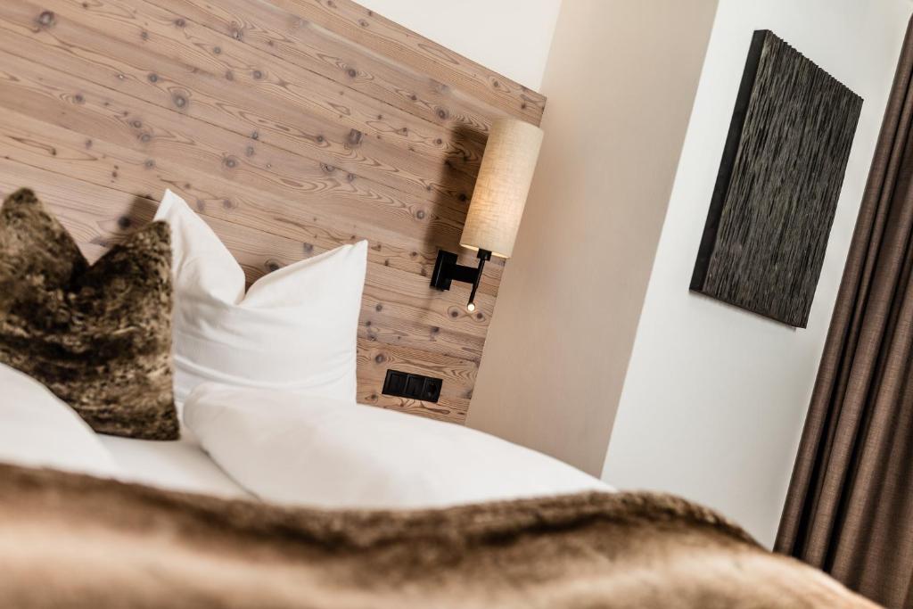Postel nebo postele na pokoji v ubytování ArtHotel Anterleghes - Gardenahotels