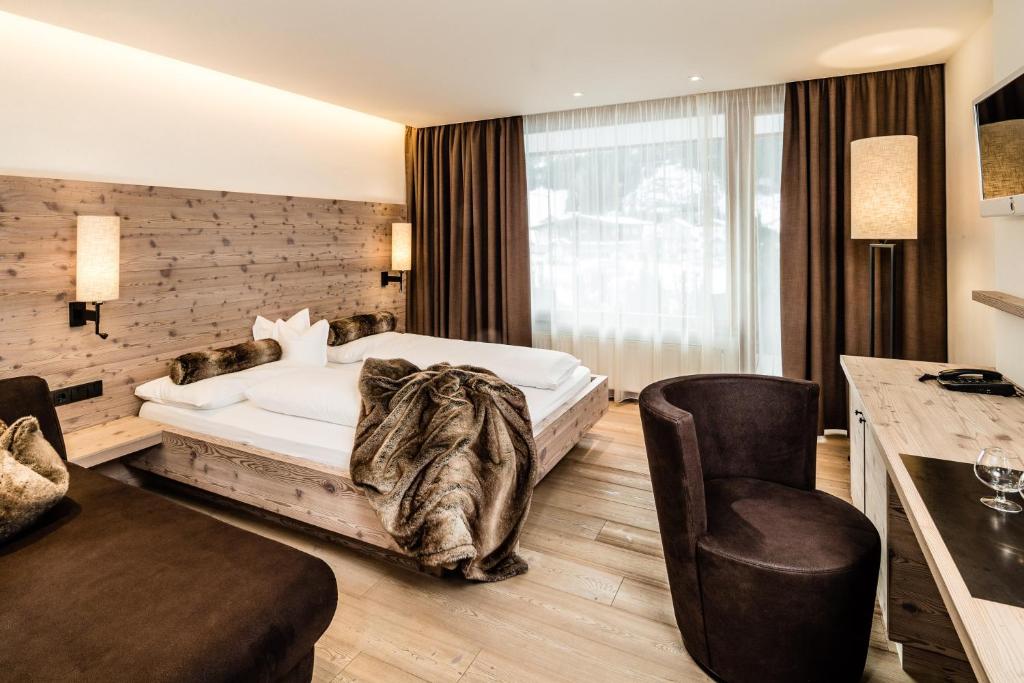 Postel nebo postele na pokoji v ubytování ArtHotel Anterleghes - Gardenahotels