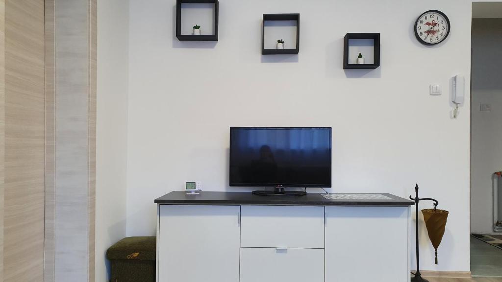 TV a/nebo společenská místnost v ubytování IMPERIUM stan na dan