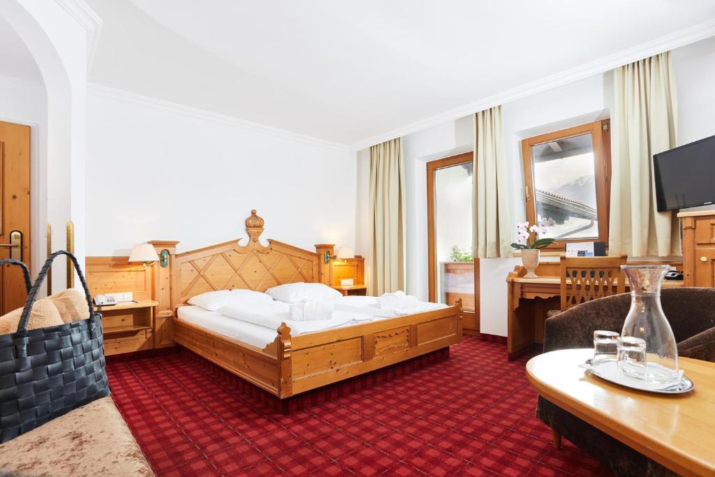 Ein Bett oder Betten in einem Zimmer der Unterkunft All In Resort Schwarzbrunn - 4 Sterne Superior