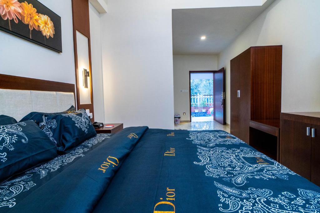 Postel nebo postele na pokoji v ubytování Grande Alpine Hotel