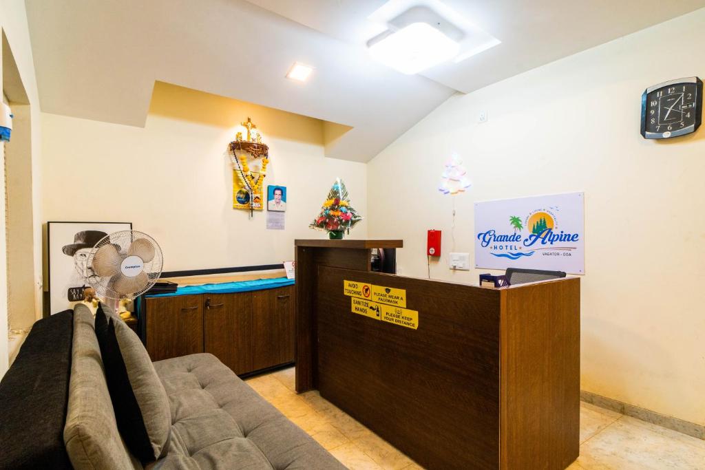 TV a/nebo společenská místnost v ubytování Grande Alpine Hotel