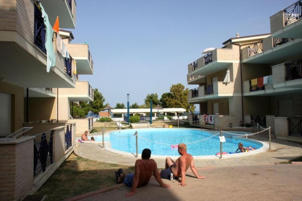 Swimmingpoolen hos eller tæt på Green Bay A7 - Pineto Vacanza