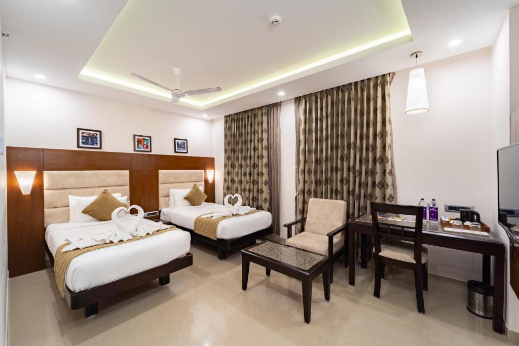 Postel nebo postele na pokoji v ubytování La Grrande Malar - The Boutique Hotel Pondicherry