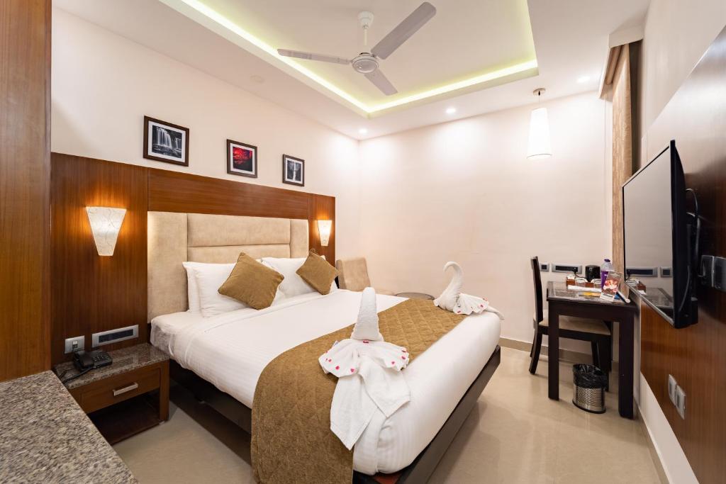Postel nebo postele na pokoji v ubytování La Grrande Malar - The Boutique Hotel Pondicherry